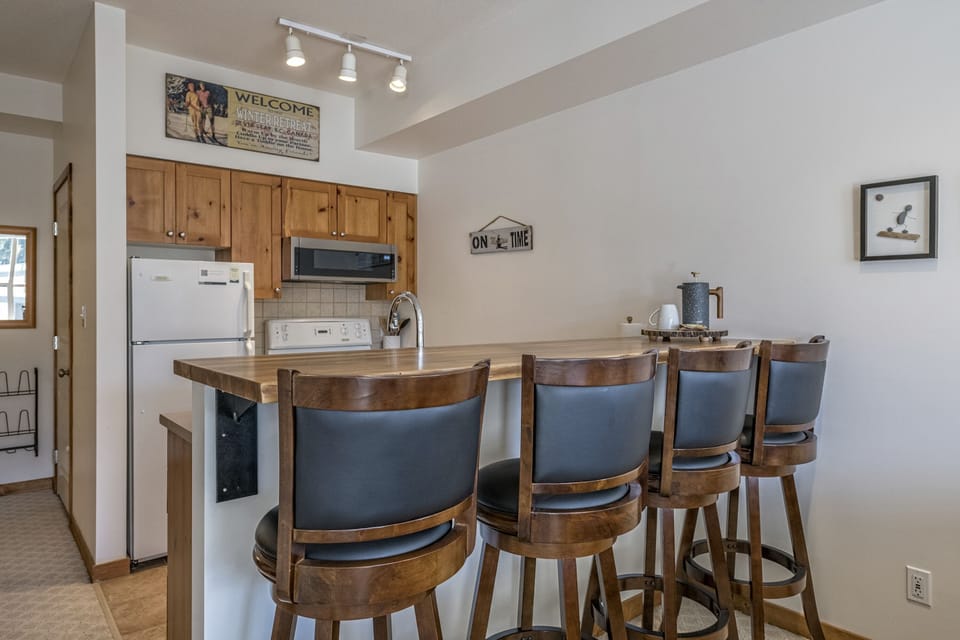 Kitchen with Live Edge Breakfast Bar 