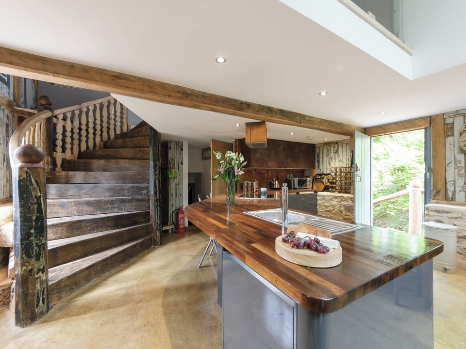 Kitchen and unique wooden staircase | The Retreat, Longhope, near Gloucester