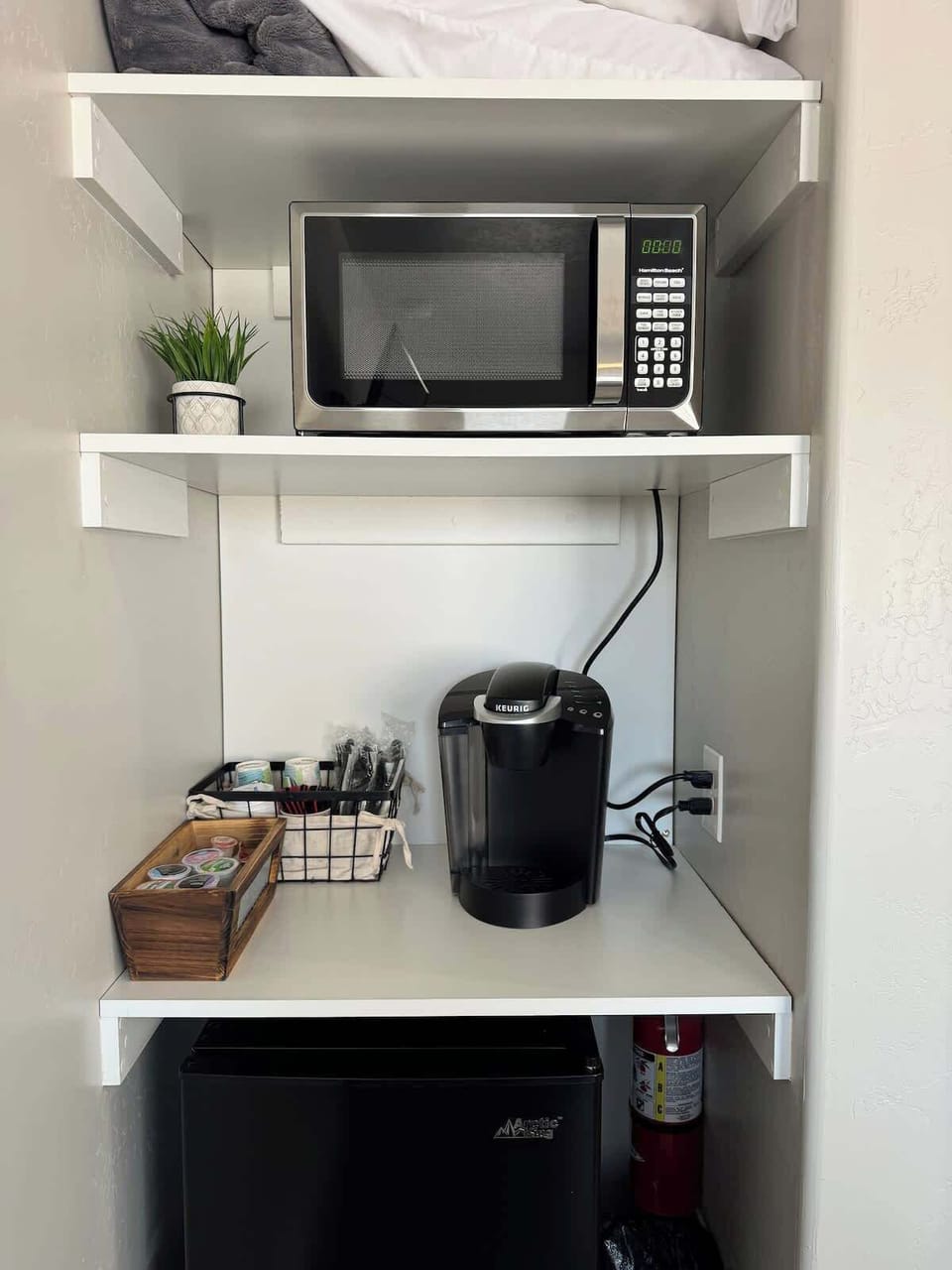 Microwave and coffee maker (coffee and tea provided)