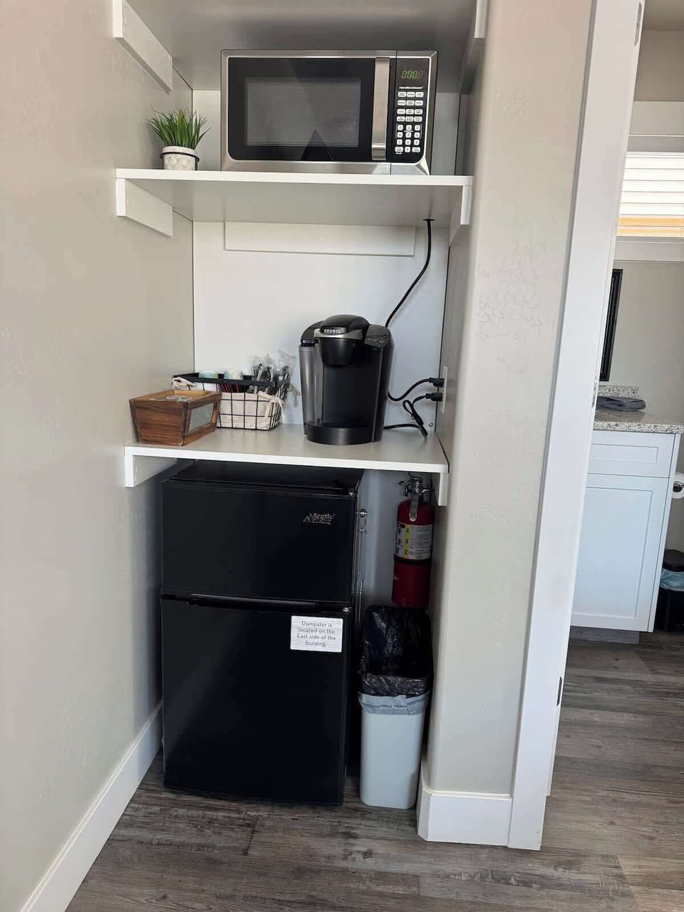 Mini fridge with feezer, coffee bar, and microwave