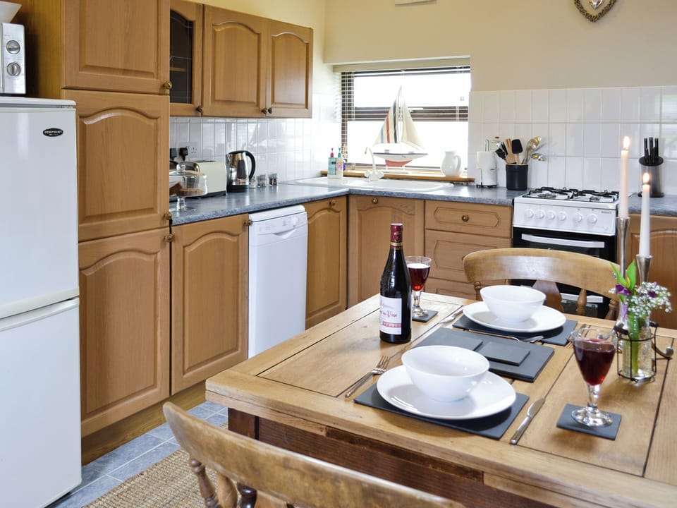 Kitchen/diner | Coastal Wood Holidays - The Nook, Marros, nr. Amroth