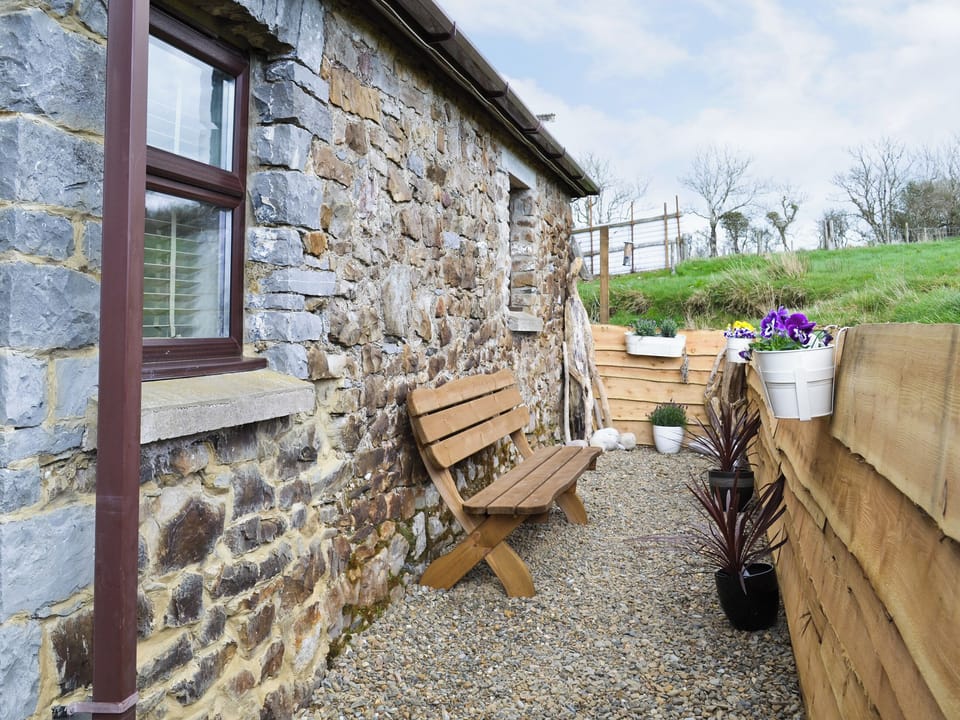 Sitting-out-area | Coastal Wood Holidays - The Nook, Marros, nr. Amroth
