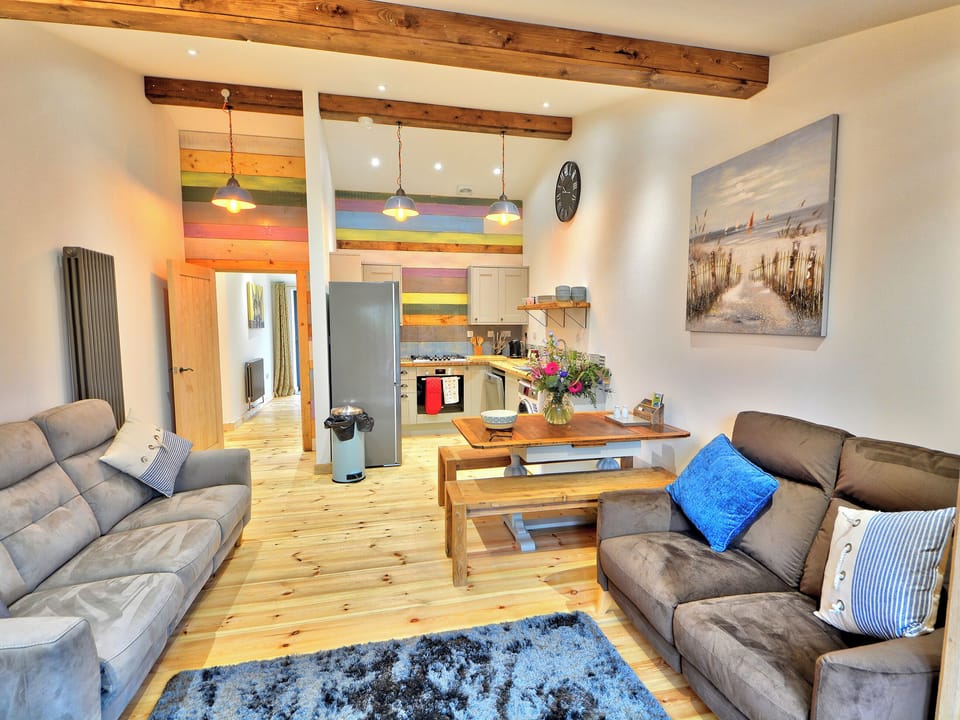 Open plan living space with wooden floor | Orion - Rossiter&rsquo;s Vineyard Barn, Wellow, near Yarmouth