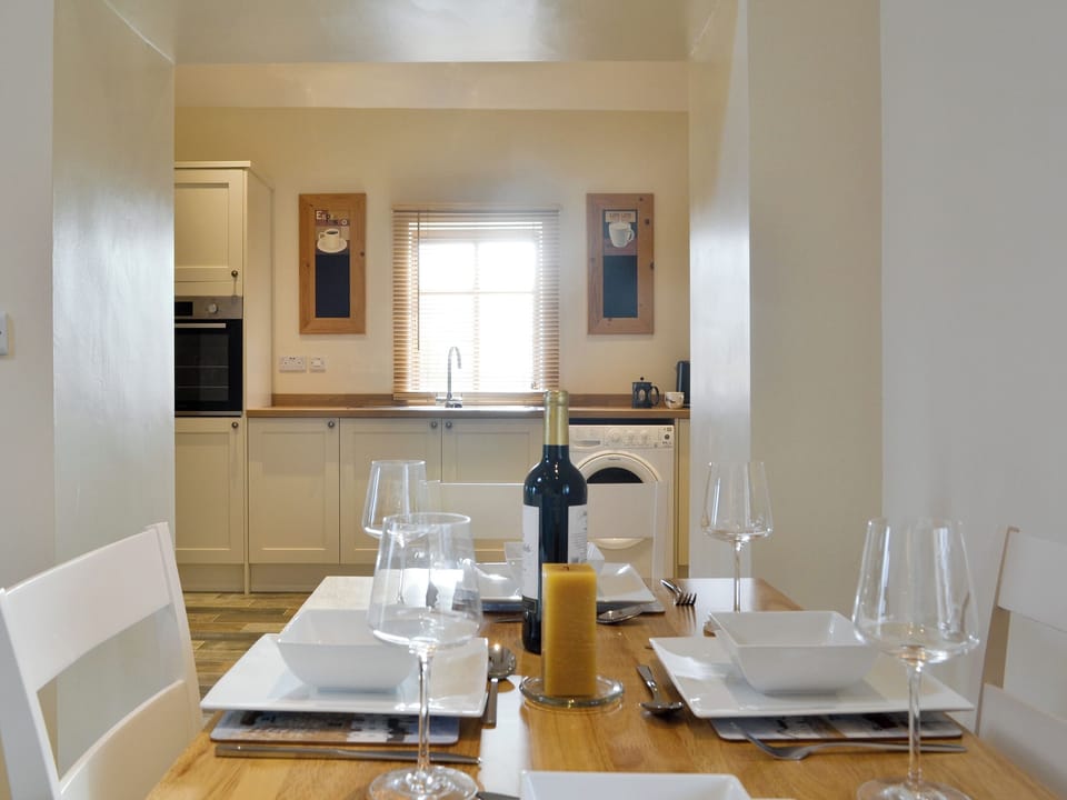 Convenient dining area with open aspect to kitchen | Lapwing Cottage - Cerrig Cottages, Caergeiliog, near Rhosneigr