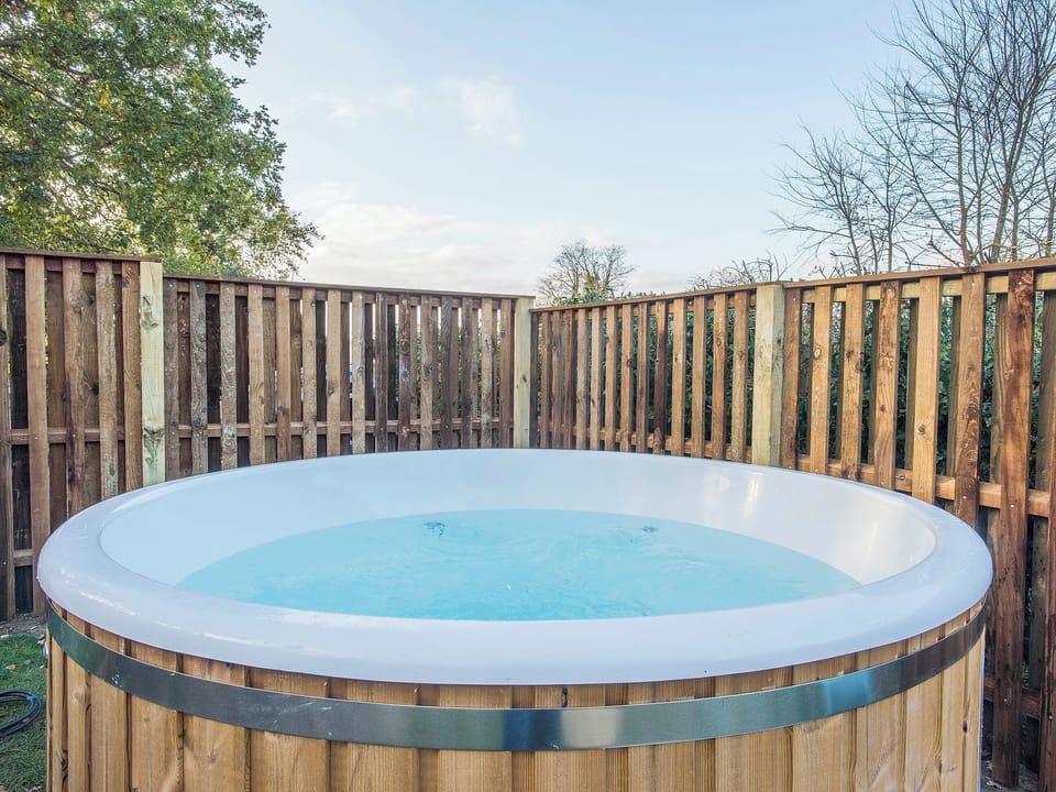 Hot tub | Meadowsweet Cottage - Swardeston Cottages, Swardeston, near Mulbarton
