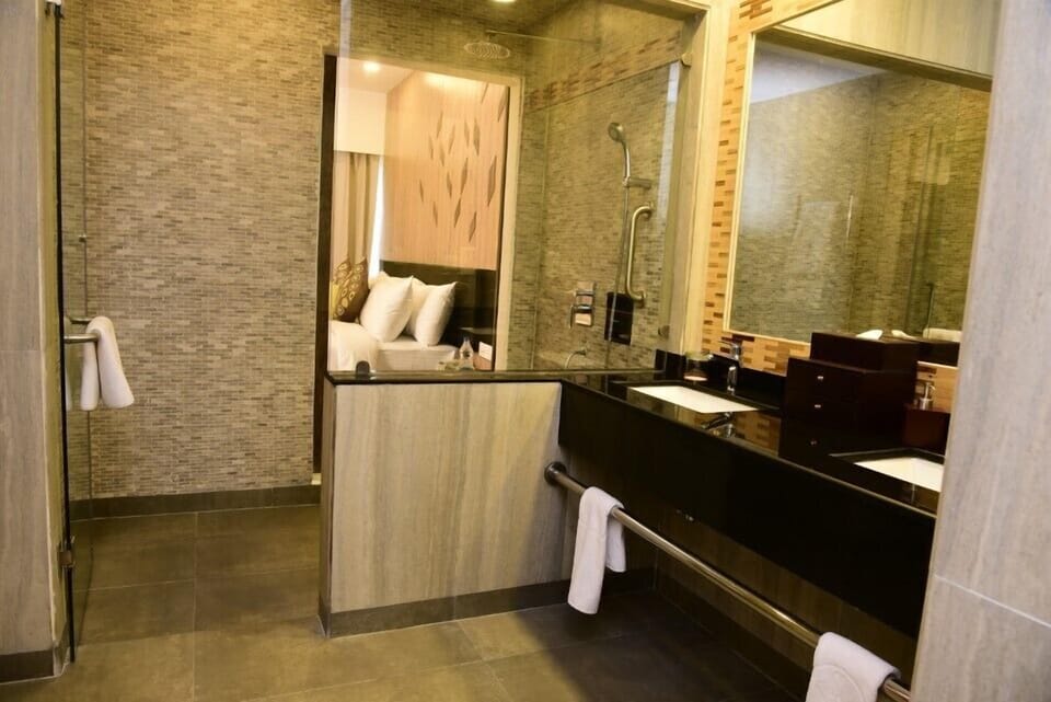 Executive Suite | Bathroom | Bathrobes, slippers, towels