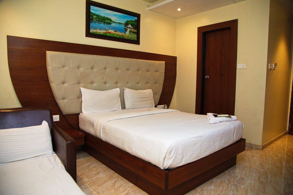 Deluxe Triple Ac Room | Free WiFi, bed sheets