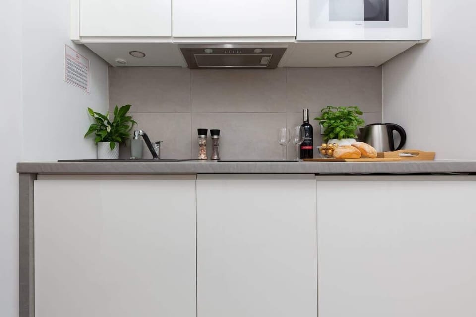 The kitchenette's practical layout maximizes space and functionality.
