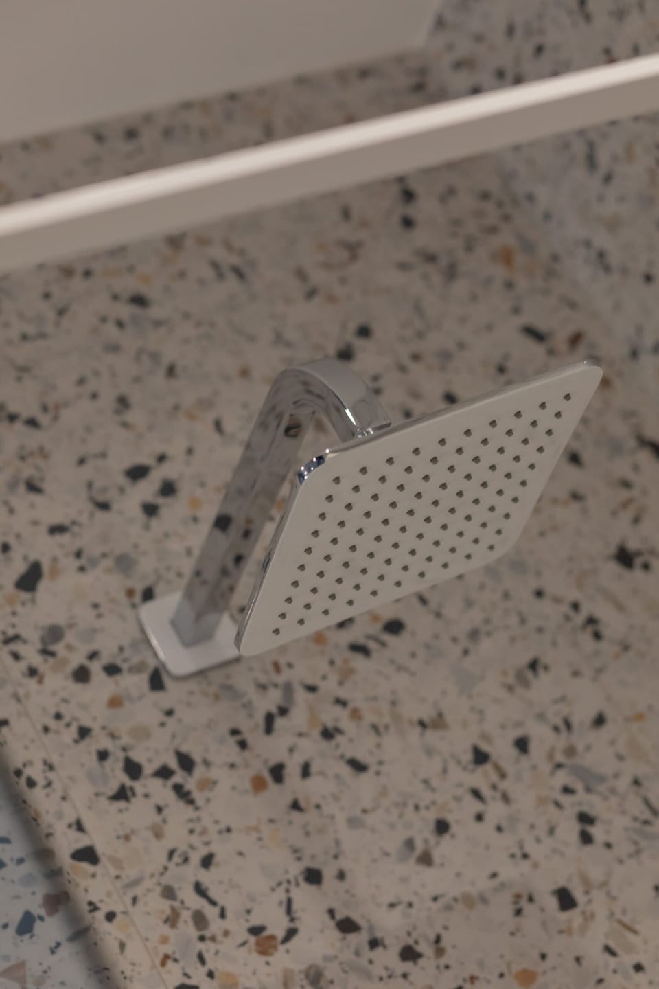 The impartial shower cabin is equipped with a rain shower