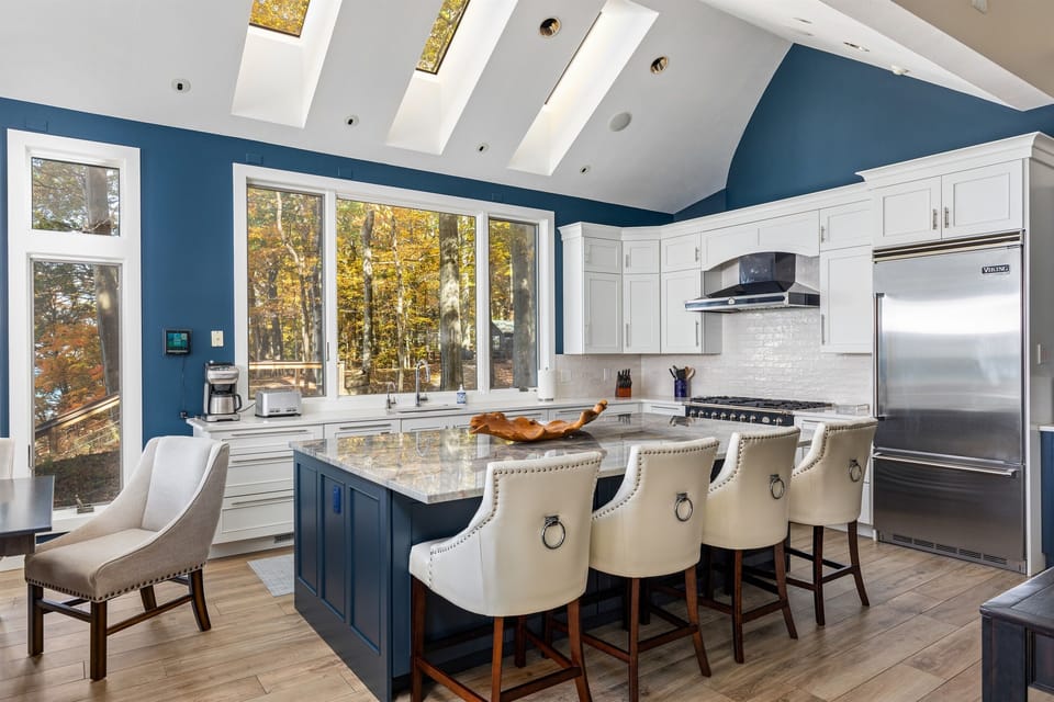 Take in the dazzling kitchen décor and convenient island.
