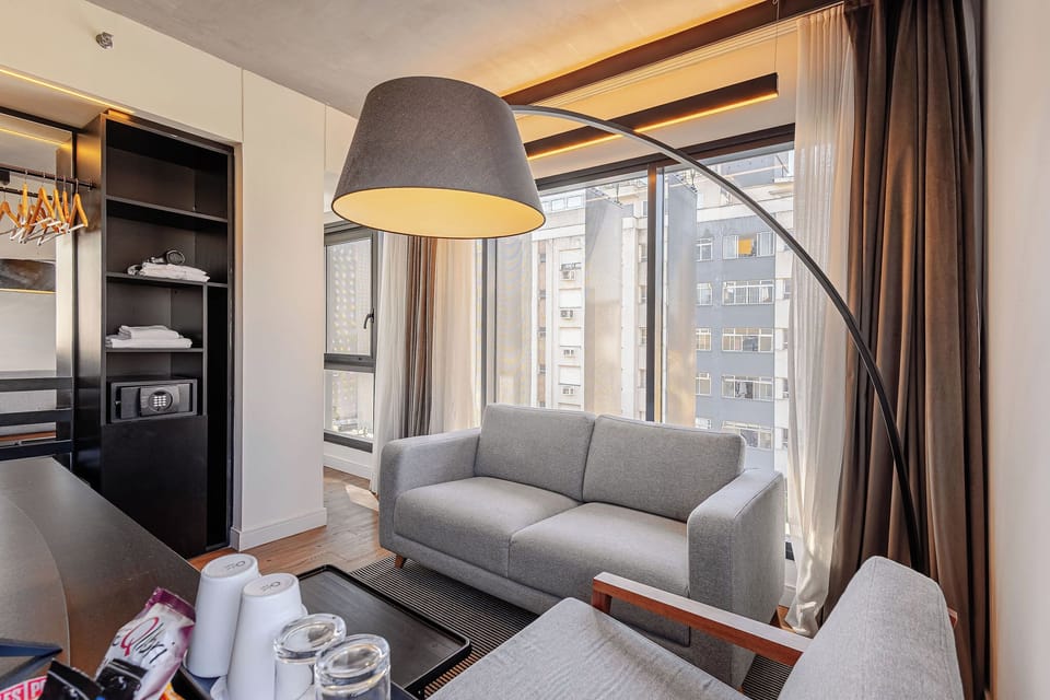 Family Room, Multiple Beds | Minibar, in-room safe, individually decorated, desk