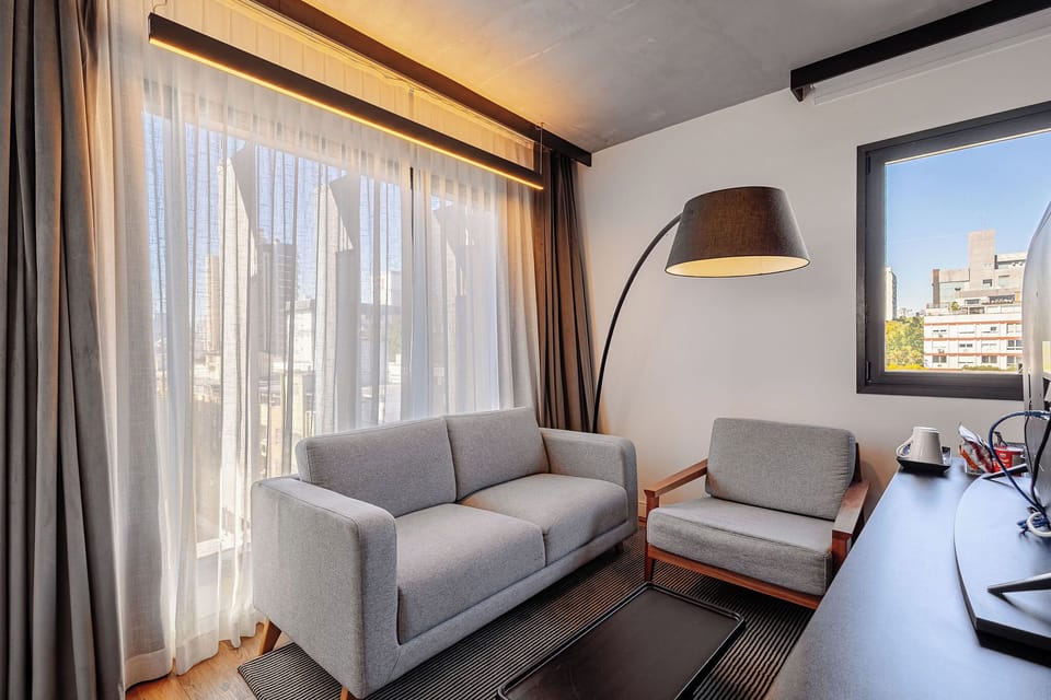 Family Room, Multiple Beds | Minibar, in-room safe, individually decorated, desk