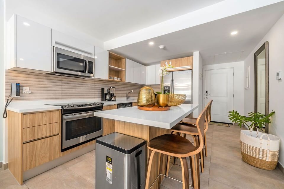 Your serene retreat awaits with a plush bed, bright natural light, and private patio access—perfect for morning coffee or peaceful sunset views.