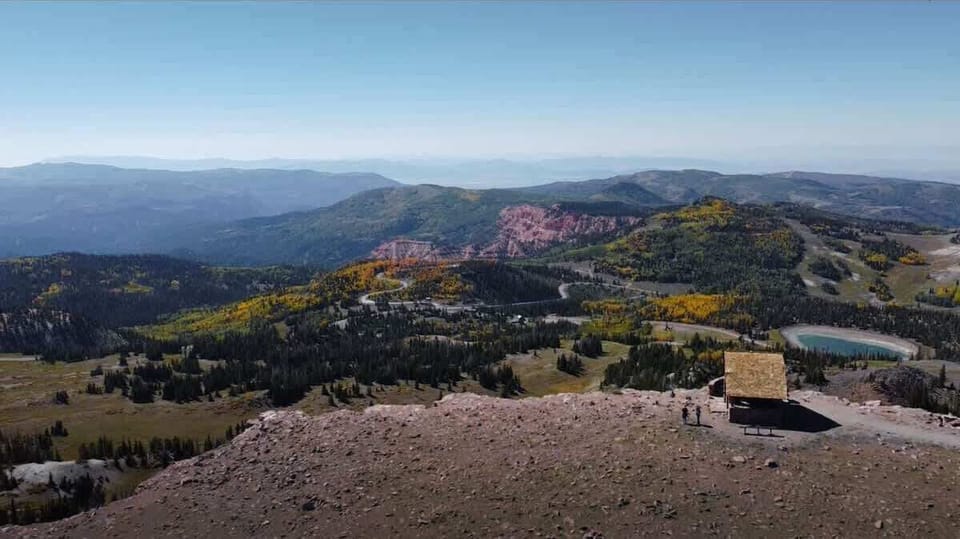 You will be captivated by this stunning panoramic view! Enjoy the expansive vistas of rolling hills and vibrant forests. This scenic landscape provides the perfect backdrop for relaxation and outdoor adventures. (Brian Head Peak in the Fall)