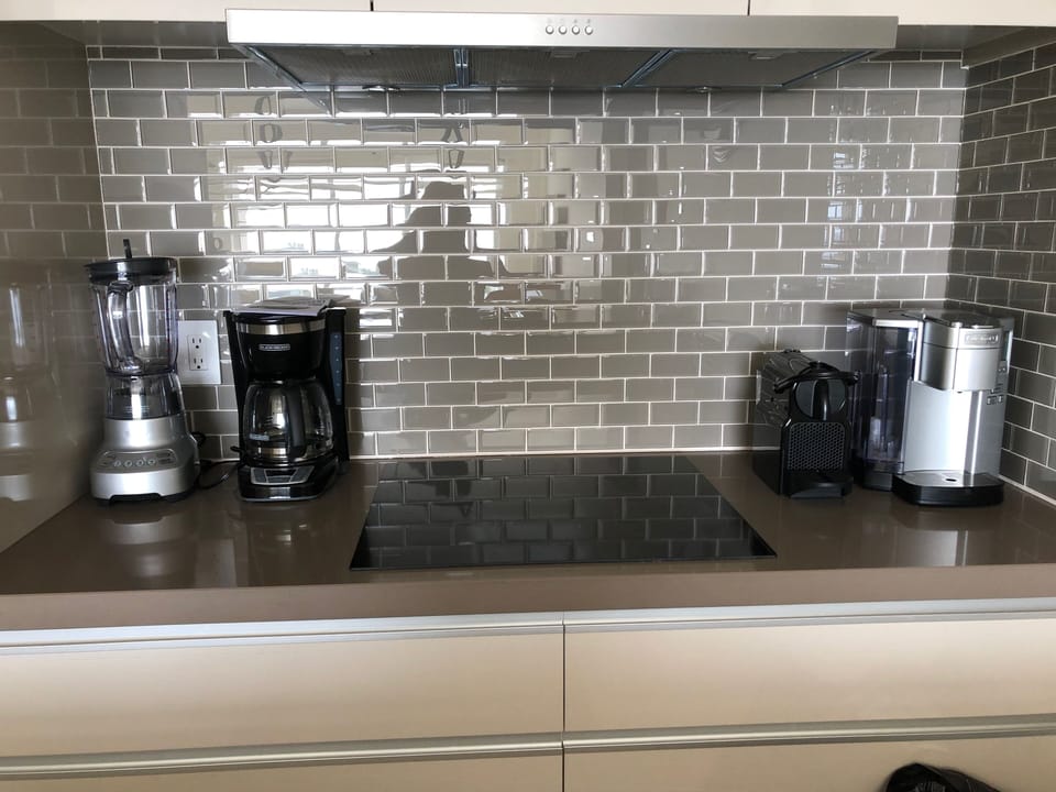 View of cooking area in kitchen