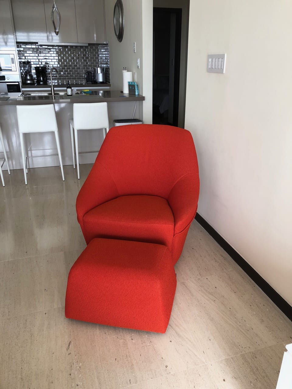 Accent chair and ottoman in living room