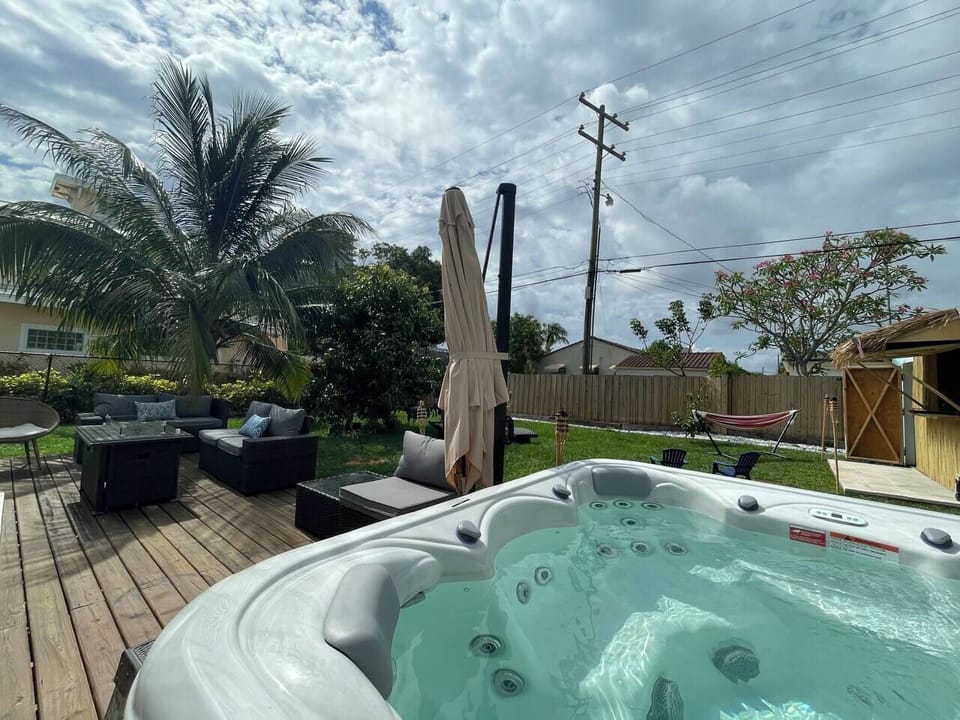 Enjoy the tropical vibes in our backyard throughout your stay.