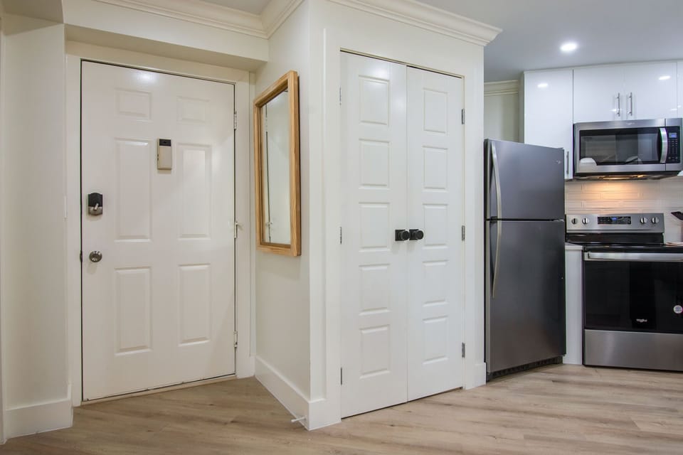 Kitchen with washer and dryer unit