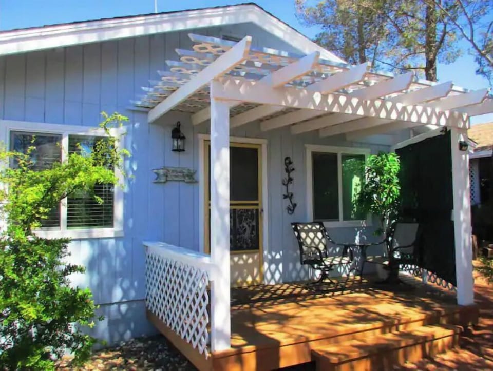 The front porch is a favorite place to unwind.and watch the birds come and go.