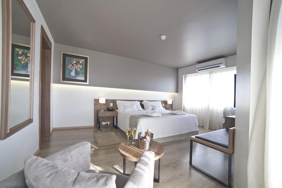 Deluxe Double or Twin Room | Minibar, in-room safe, desk, soundproofing