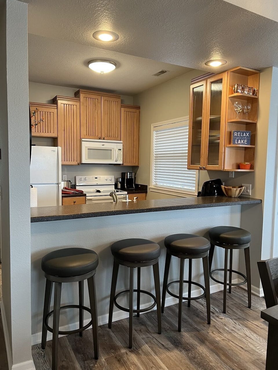 Breakfast bar with seating for four. 