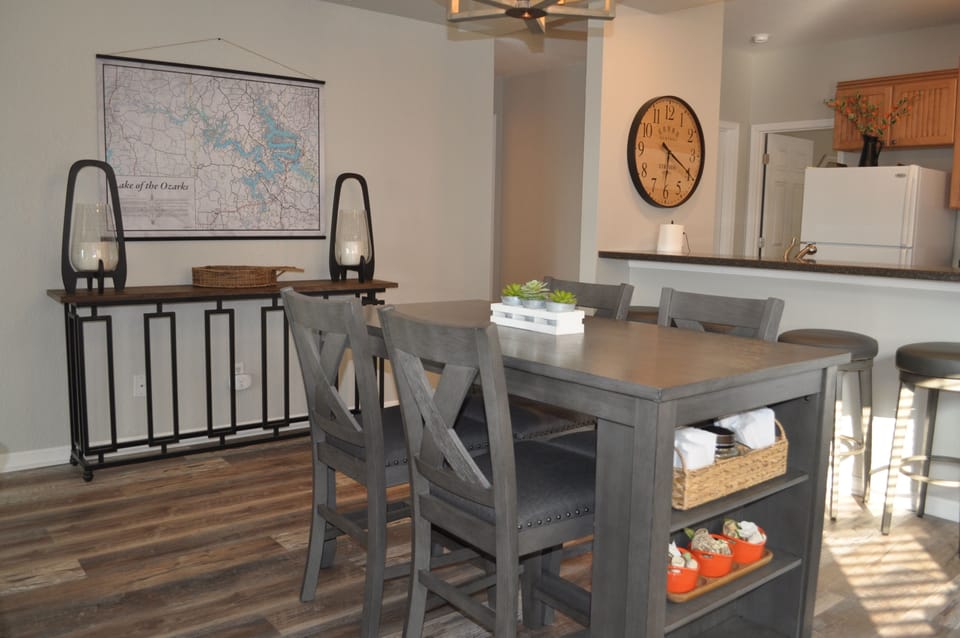 View of dining area, located between living room and kitchen. 
