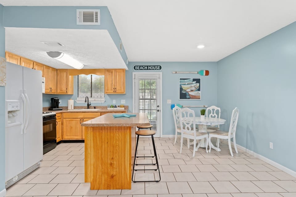 Kitchen with seating for 6.