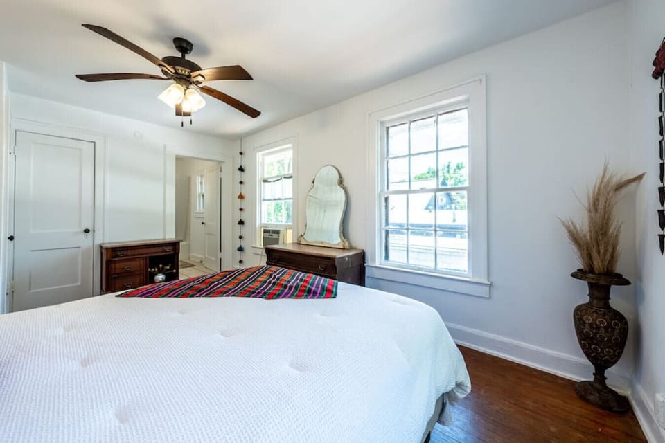 Comfortable queen bed with large headboard
