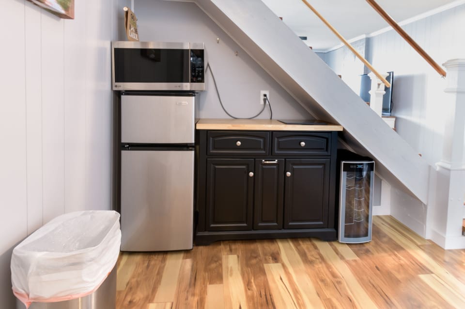 extra fridge, microwave and wine fridge in downstairs.