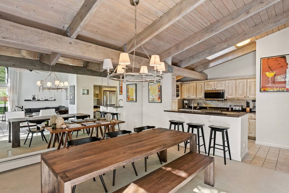 Enjoy dining with your traveling companions at the custom dining table or enjoy a quick bite at the breakfast bar.