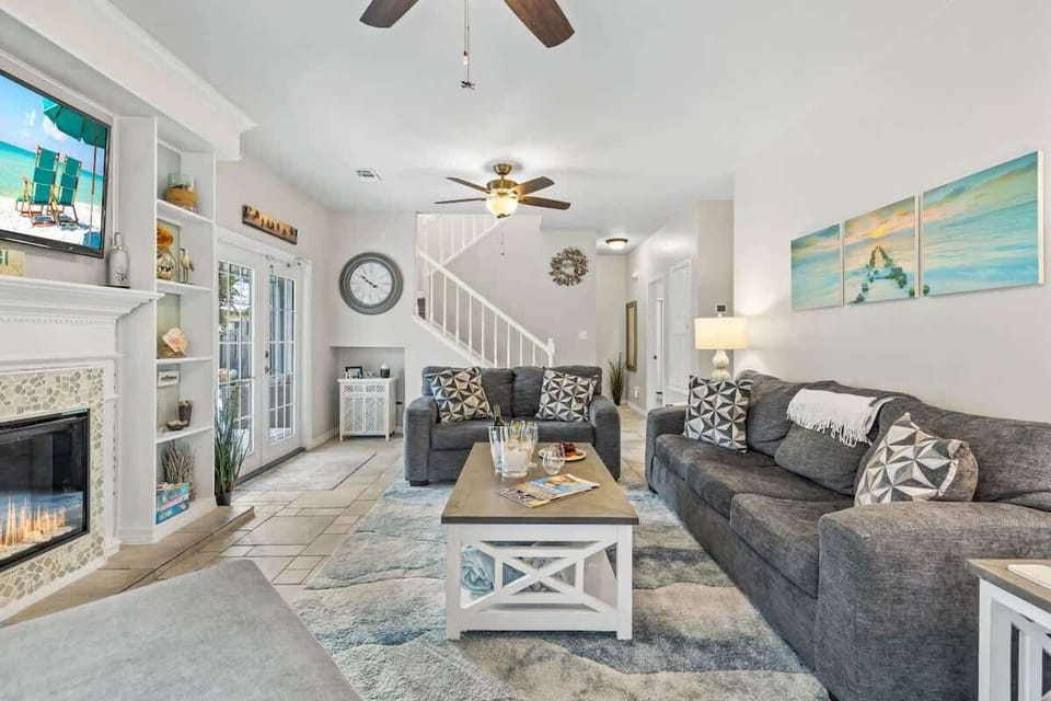 Living room with entrance to pool area and second floor (1st floor)