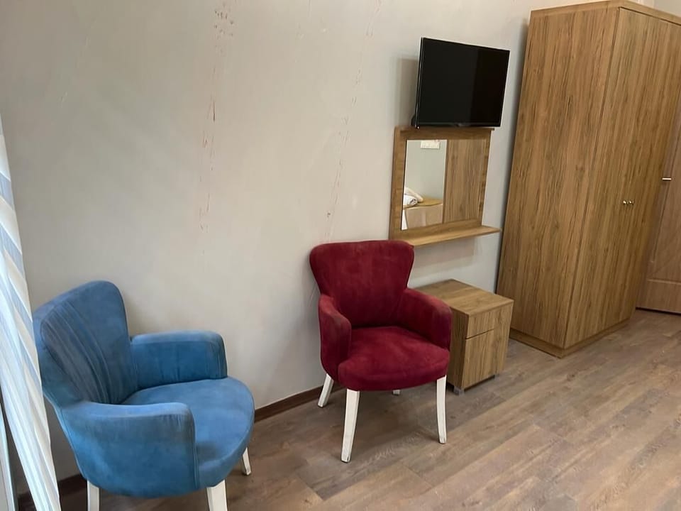 Business Quadruple Room, Multiple Beds | Living area | Printers