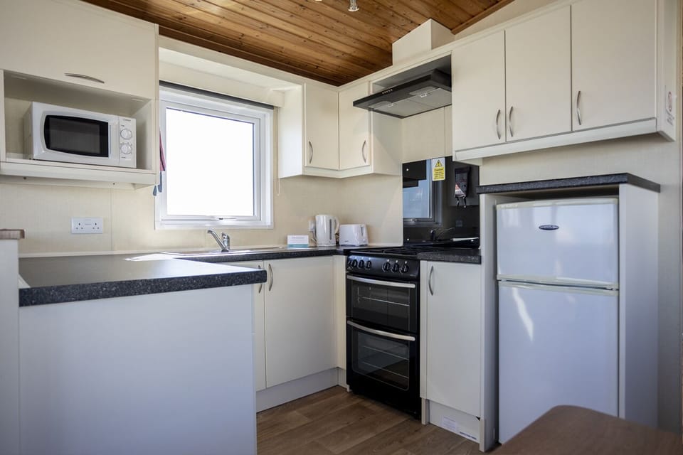 Microwave, oven, toaster, cookware/dishes/utensils