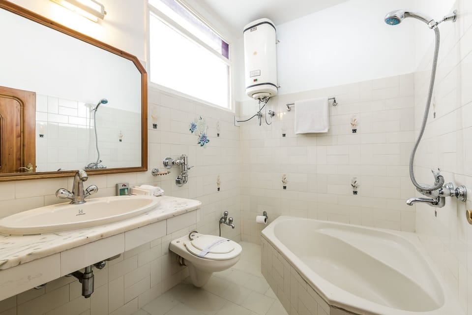 Separate tub and shower, free toiletries, towels, soap
