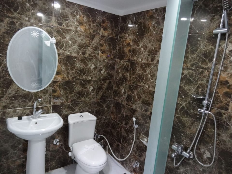 Comfort Room | Bathroom | Shower, free toiletries, slippers, soap