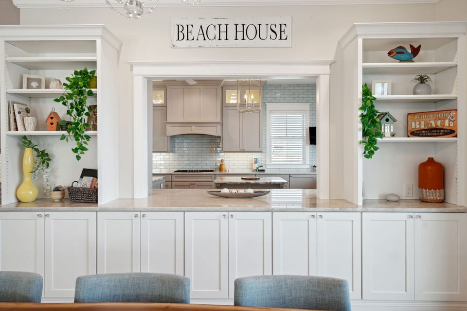 Home features a kitchen pass through window for easy meal service.