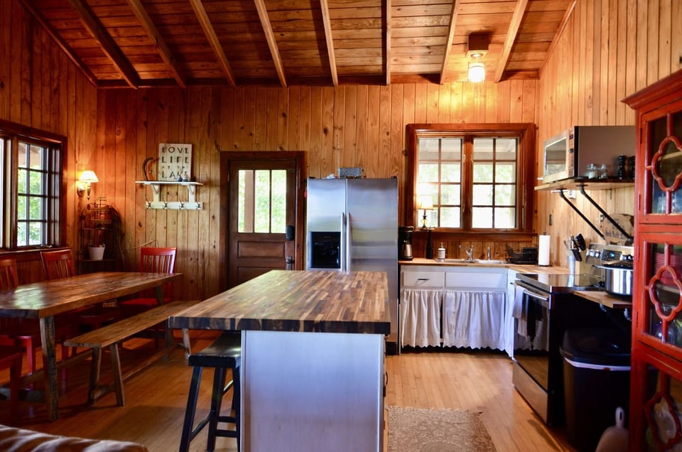 Open floor plan with kitchen and dining