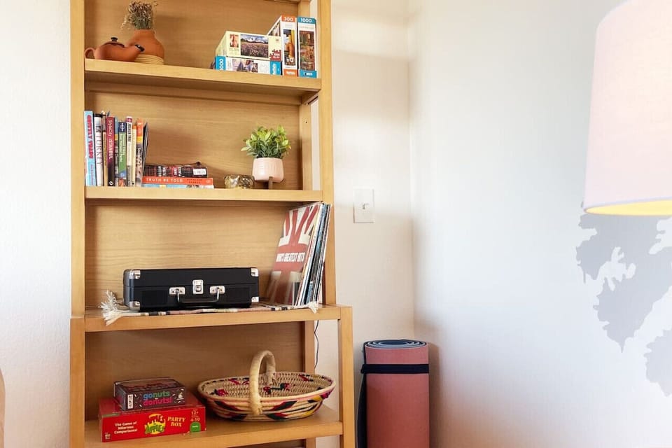 Yoga mats, games, a turntable, and some books to build memories or just relax!
