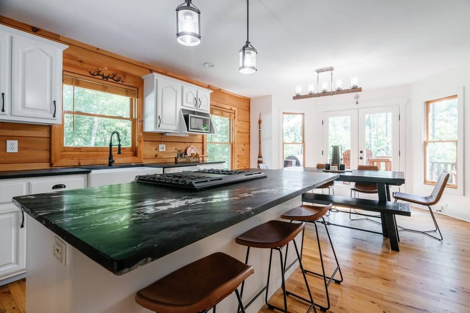 Newly renovated and fully stocked kitchen with all basic cooking necessities.