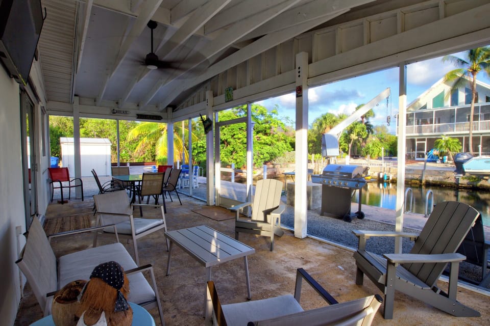 Back screened in Patio overlooking the Canal