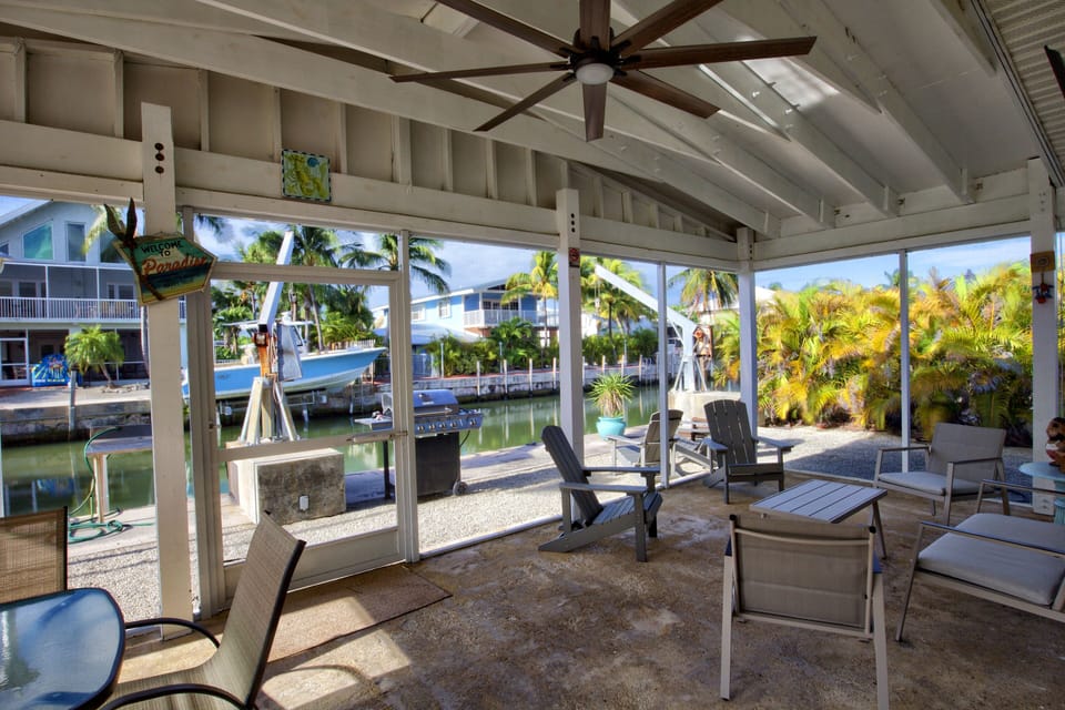 Back screened in Patio overlooking the Canal