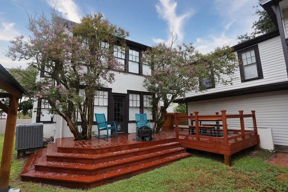 Backyard deck with fire pit and picnic table to enjoy the outdoors!