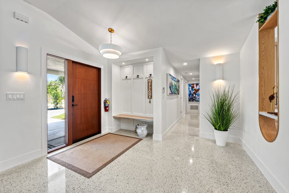 Step into a welcoming entry where you can leave your flip-flops behind, and instantly feel at home.