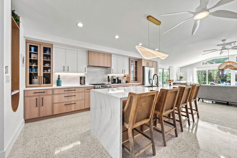 Enjoy a bright, airy space with coastal-modern accents where cooking and conversation flow seamlessly.