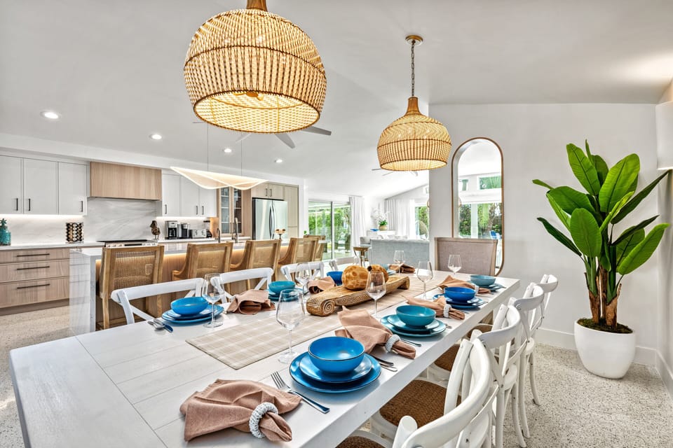 The dining table with the kitchen just steps away, making serving meals effortless and fun.