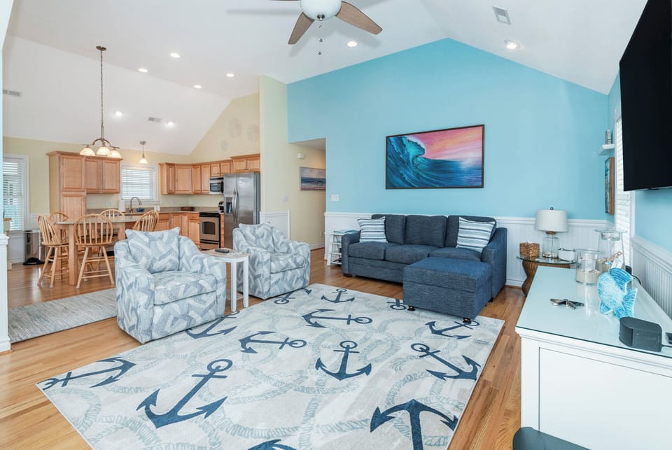 Living room with 65 in TV with surround sound
