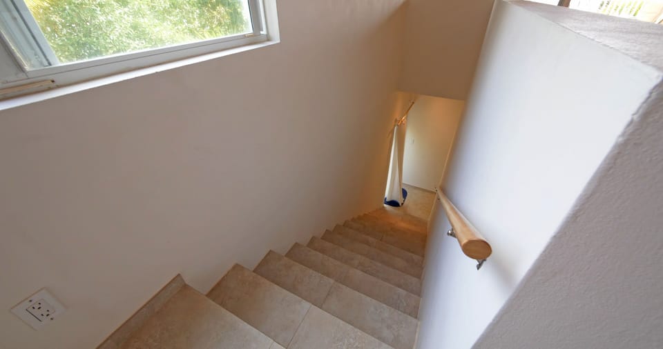 Stairs to Bedroom section of Hibiscus Beach House