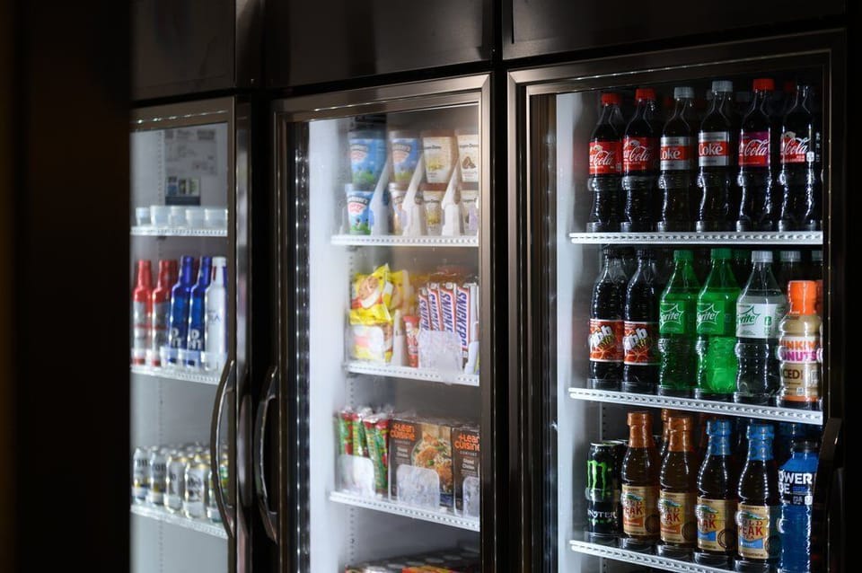 A well-stocked vending area showcases a variety of snacks and beverages, providing convenient options for guests on the go.