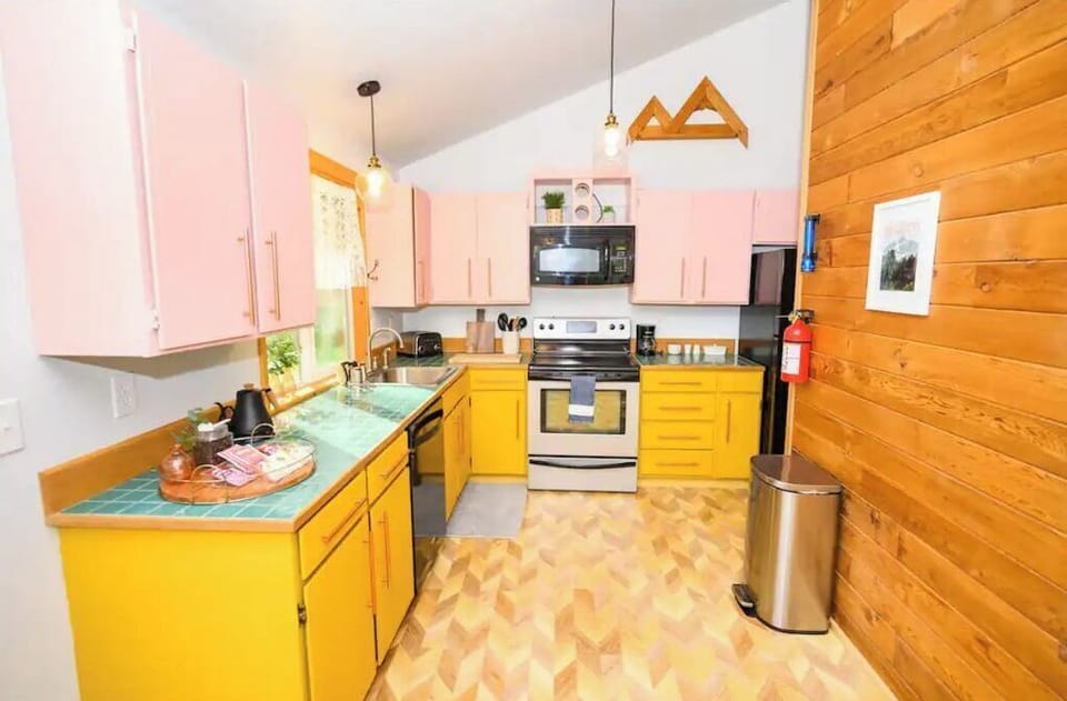 Kitchen has all that you need for your with and a pop of color to keep things 