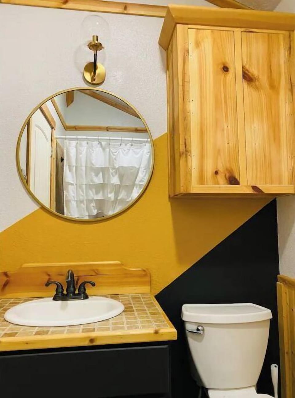Newly painted bath and details helps update the cabin where it counts…